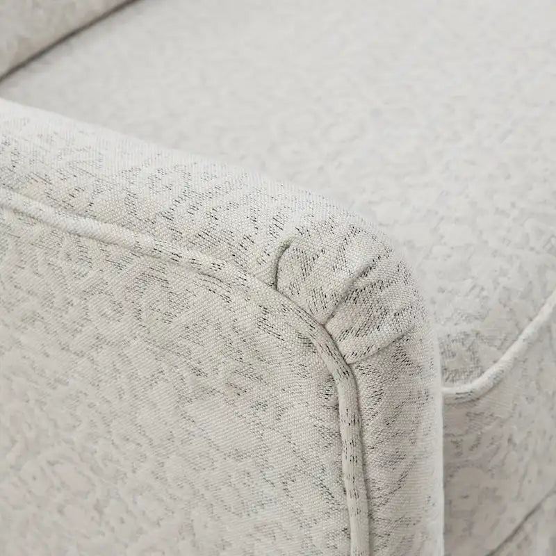 Ivory and Black 360-Degree Swivel Glider Chair with Lumbar Pillow